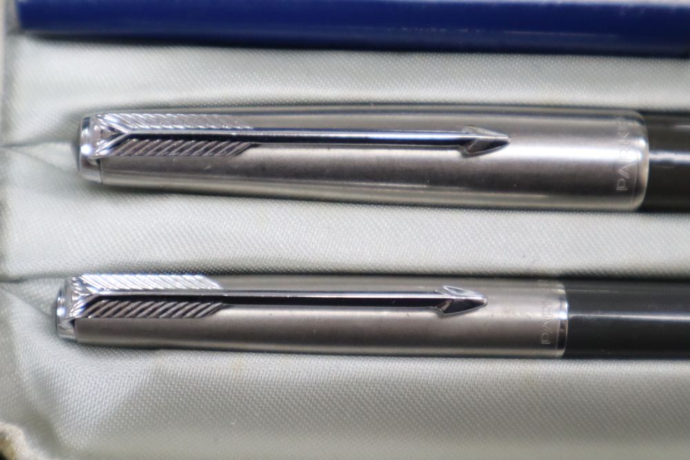 A Parker fountain pen and propelling pencil marked PM Thatcher and Easterbrook pen